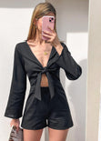 Enterizo de short con anudado en escote y manga larga color negro para mujer - Flashy