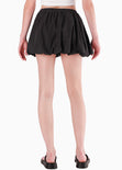 Falda corta englobada color negro para mujer - Flashy