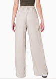 Pantalón ancho con bolsillos cargo, elástico en cintura y anudado color beige para mujer - Flashy