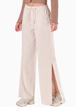 Pantalón con abertura en costados y ajustable en cintura color beige para mujer - Flashy
