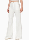 Pantalón flare de tiro alto con cortes color blanco, marfil para mujer - Flashy