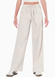 Pantalón recto tipo lino con elástico en cintura y anudado color beige para mujer - Flashy
