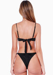 Panty de vestido de baño con la pretina en v y anudados en costados color negro para mujer - Flashy