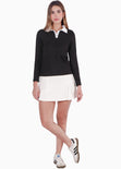 Buzo tipo polo con cuello en contraste color negro para mujer - Flashy