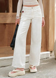Jean wide leg tiro medio con corte y bordado de corazón para mujer - Flashy