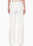 Pantalón flare de tiro alto con cortes color blanco, marfil para mujer - Flashy