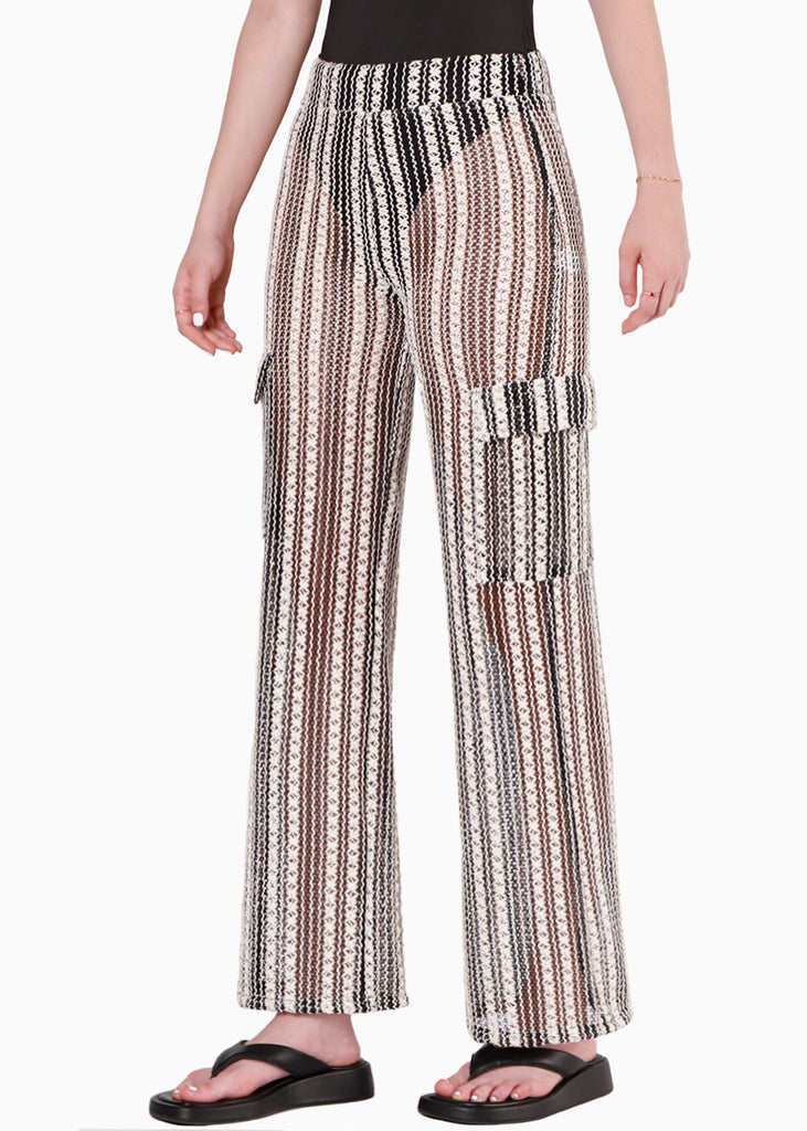 Pantalón recto de tela tipo crochet y con elástico en cintura color negro para mujer - Flashy