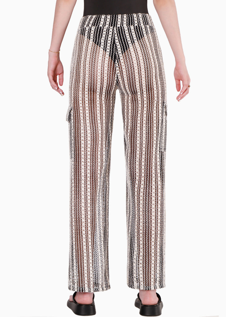 Pantalón recto de tela tipo crochet y con elástico en cintura color negro para mujer - Flashy