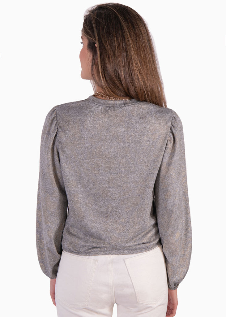 Buzo gris con mangas embombadas y tela metalizada